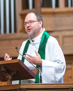 Jeff Martinhauk preaching at pulpit